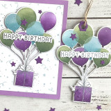 Handmade greeting card with balloons holding a present up on it with matching gift tag with both having happy birthday sentiment on them. Handmade greeting card with balloons holding a present up on it with matching gift tag with both having happy birthday sentiment on them.
