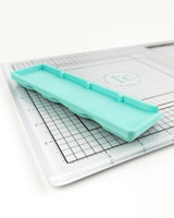 Image of Glassboard Buddy - Mini Ink Cubes which is a magnetic tray that holds mini ink pads.
