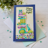 Handmade greeting card with a scooter on it holding presents with happy birthday to you sentiment on it.