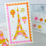 Handmade greeting card with Eiffel tower on it with balloons and miss you sentiment on it.