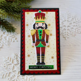Handmade greeting card with a nut cracker on it with merry Christmas sentiment on it.