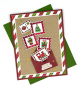 Handmade greeting card of Christmas postage stamps with merry Christmas sentiment on it.