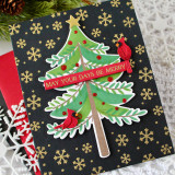 Handmade greeting card with Christmas tree on it with May Your Days Be Merry sentiment on it.