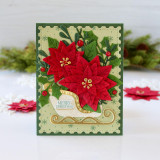 Handmade greeting card with flowers on it and a sleigh with merry Christmas sentiment on it.