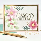 Handmade greeting card with flowers on it and season's greeting sentiment on it.