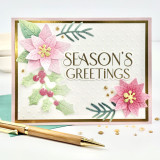Handmade greeting card with flowers on it and season's greeting sentiment on it.