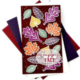 Handmade greeting card with leaves on it and happy fall sentiment on it.