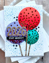 Handmade greeting card with sparkles on it and 2026 stay groovy sentiment on it.