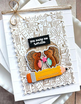 Handmade greeting card with two hedgehogs on it and you make me smile sentiment on it.