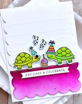 Handmade greeting card with two turtles on it and a cupcake with eat cake and celebrate sentiment on it.