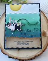 Handmade greeting card with scuba diving dog and bird on it with hope your birthday goes swimmingly sentiment on it.