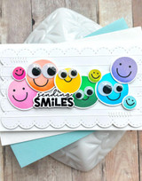 Handmade greeting card with smiley faces on it and sending smiles sentiment on it.