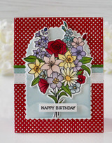 Handmade greeting card with flowers on it and happy birthday sentiment on it.