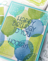 Handmade greeting card with balloons on it and happy birthday to you and hooray sentiment on it.
