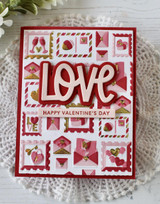Handmade greeting card with envelopes and hearts on them with love sentiment and happy valentine's day sentiment on it.