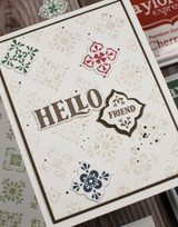 Handmade greeting card with tiles on it and hello sentiment on it.