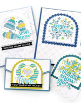 Four handmade greeting cards and tags with winter themed items on each.