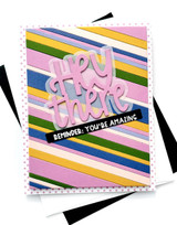 Handmade greeting card with flowers on it and hey there sentiment on it.