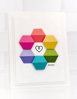 Handmade greeting card with hexagons on it and xoxo sentiment on it.