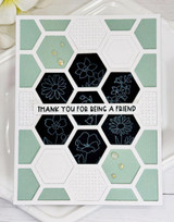 Handmade greeting card with hexagons on it and thank you for being a friend sentiment on it.