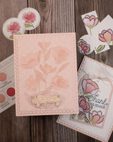 Handmade greeting card with flowers on it and with sympathy sentiment on it.