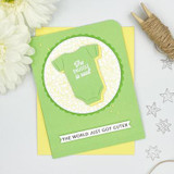 Handmade greeting card with onesie on it and the snuggle is real sentiment on it.