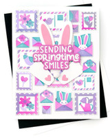 Handmade greeting card with springtime postage on it and sending springtime smiles sentiment on it.