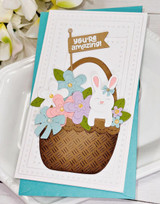 Handmade greeting card with a bunny in a basket on it and you're amazing sentiment on it.