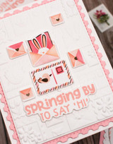 Handmade greeting card with envelopes on it and springing by to say hi sentiment on it.