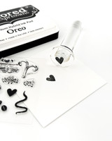 Image of TE Acrylic Handle with stamp on it.