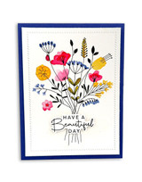 Handmade greeting card with flowers on it and and have a beautiful day sentiment on it.