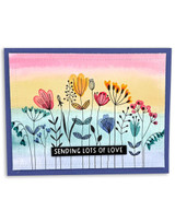 Handmade greeting card with flowers on it and sending lots of love sentiment on it.