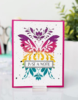 Handmade greeting card with butterfly on it and just a note sentiment on it.