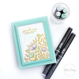 Handmade greeting card with flowers on it and sending smiles sentiment on it.