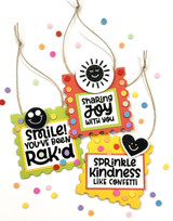 Three handmade greeting tags with various sentiments and shapes on each.