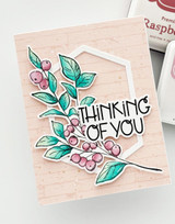 Handmade greeting card with sprigs on it and thinking of you sentiment on it.