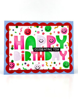 Handmade greeting card with smiley faces on it and happy birthday sentiment on it.