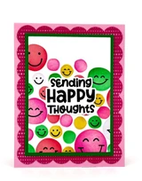 Handmade greeting card with smiley faces on it and sending happy thoughts sentiment on it.