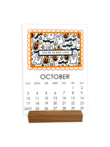 Handmade calendar with ghosts on it for October.