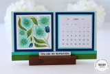 Handmade calendar with flowers on it.