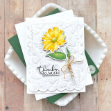 Handmade greeting card with flowers on it and thanks so much sentiment on it.