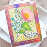 Handmade greeting card with a flower on it and thinking of you sentiment on it.