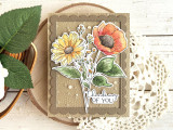 Handmade greeting card with flowers on it and thinking of you sentiment on it.