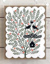 Handmade greeting card with trees on it and birds with with love sentiment on it.