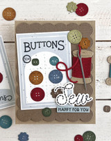 Handmade greeting card with buttons and sewing materials on it and sew happy for you sentiment on it.