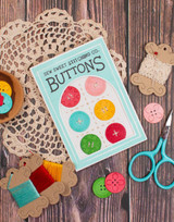 Handmade greeting card with buttons on it and buttons sentiment on it.