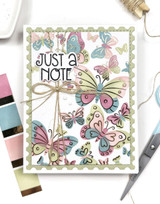Handmade greeting card with butterflies on it and just a note sentiment on it.