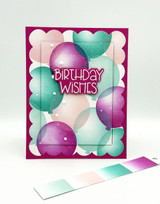Handmade greeting card with balloons on it and birthday wishes sentiment on it.