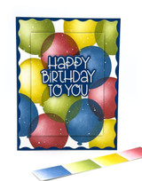 Handmade greeting card with balloons on it and happy birthday to you sentiment on it.