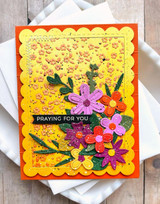 Handmade greeting card with flowers on it and praying for you sentiment on it.